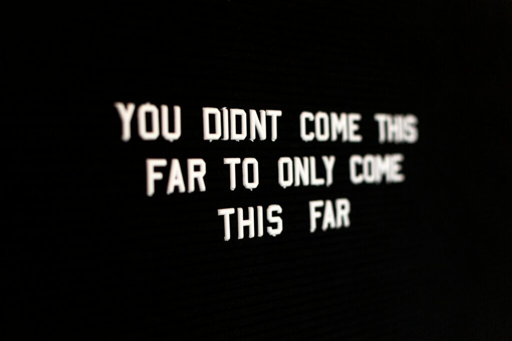 'You didn't come this far to only come this far' in white letters on a black background