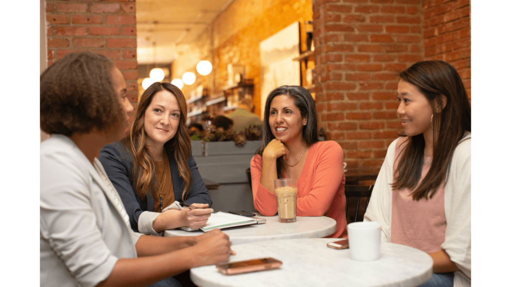 Group of women having lunch, is one of them jealous? why do women tear each other down
