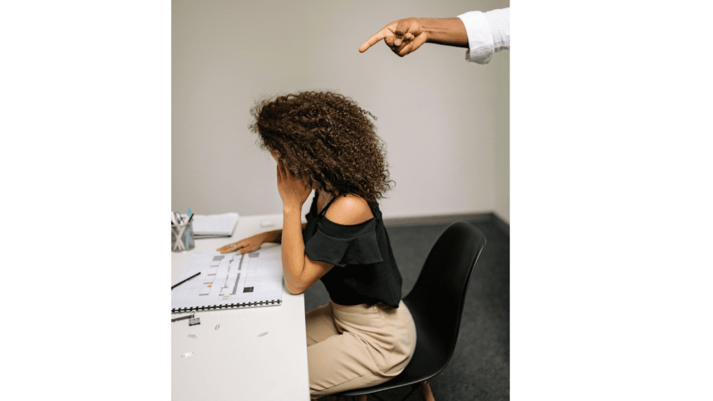woman getting yelled at by her boss toxic leadership in the workplace