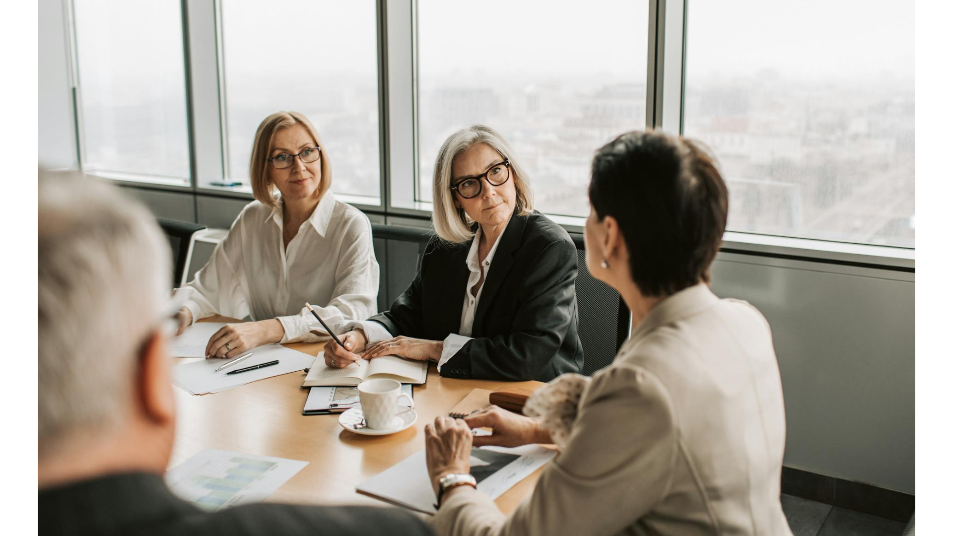 three women in a meeting at work